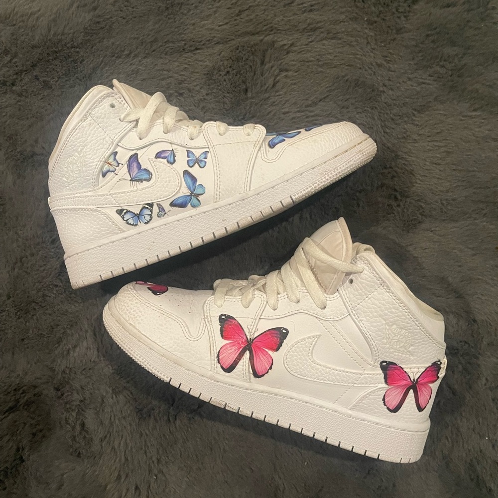 Jordan Women’s White High-Top Sneakers with Pink and Blue Butterfly Accents